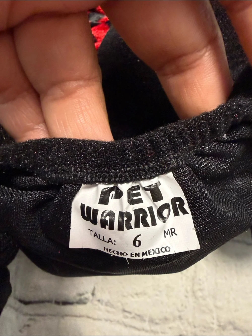 Pet Warrior Dog striped shirt with black pants custome. Halloween costume.